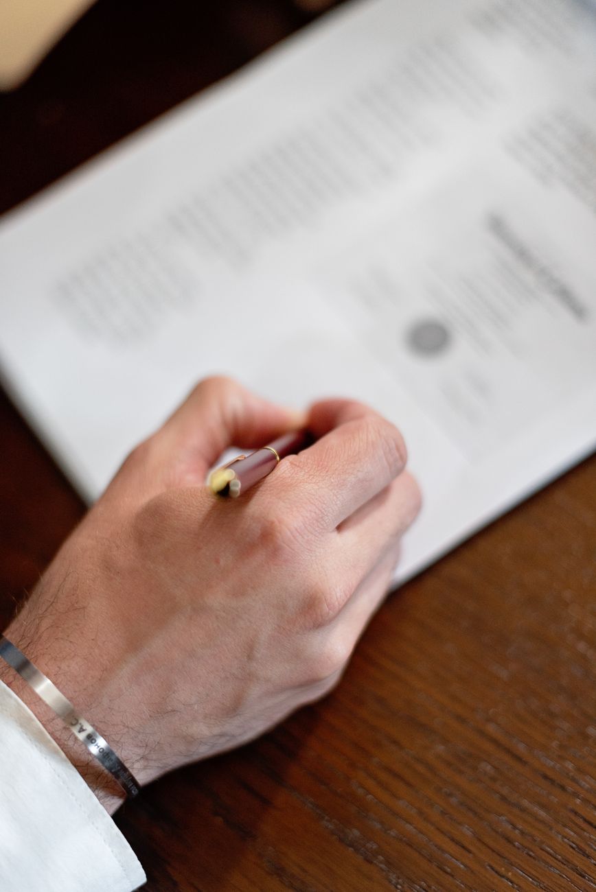 a person signing a document
